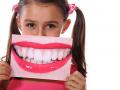 коричневый налет на зубах у детей и взрослых