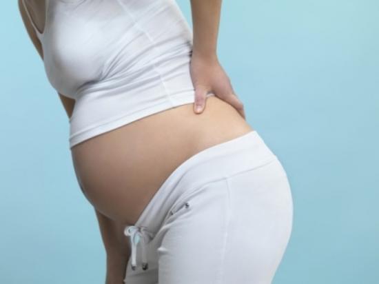 Ноющие боли в спине при беременности